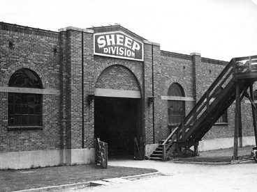 Sheep Division showing catwalk above the stockyards and stairs down to the building. Thank you to Don Strack for generously sharing this photo, part of his extensive gallery. Motorcycle parked in front of the building. Thank you to Don Strack for generously sharing this photo, part of his extensive gallery. Ogden Union Stockyards.