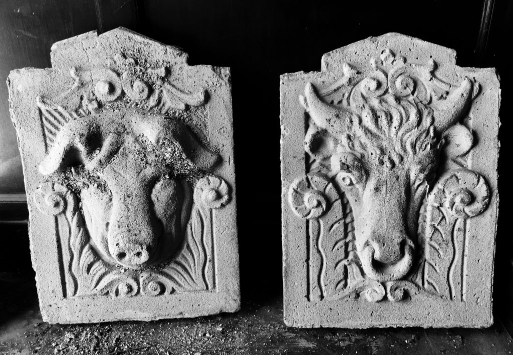 Livestock heads in stone relief from the exterior of the Ogden Union Stockyards Exchange Building. Column detail in lobby of the Ogden Union Stockyards Exchange Building. Photo credit www.Evalogue.Life - Tell Your Story, taken in 2017