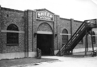 Sheep Division showing catwalk above the stockyards and stairs down to the building. Thank you to Don Strack for generously sharing this photo, part of his extensive gallery. Motorcycle parked in front of the building. Thank you to Don Strack for generously sharing this photo, part of his extensive gallery. Ogden Union Stockyards.